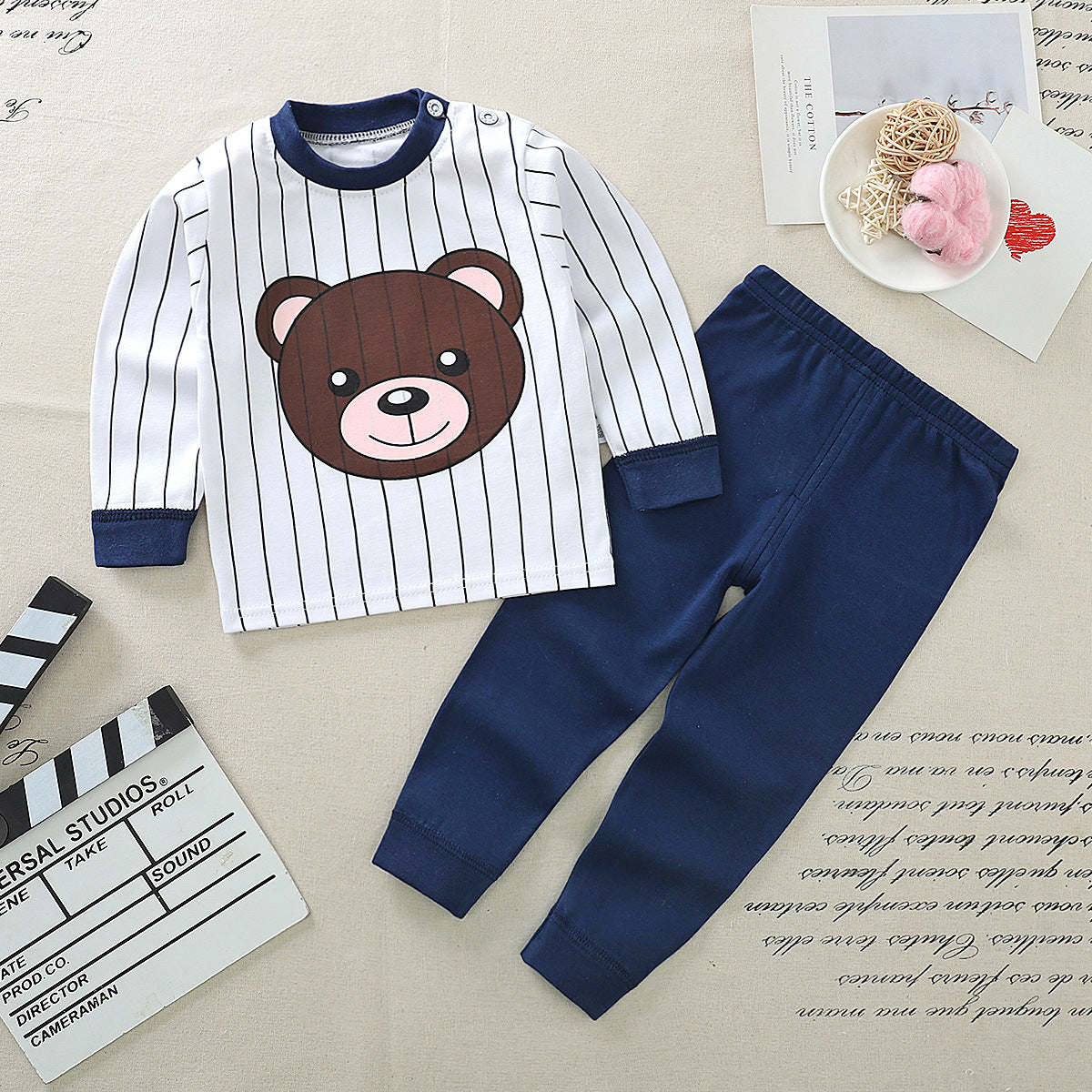 Black and white striped long-sleeve shirt with a small embroidered logo on the chest