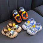 Black and white striped long-sleeve shirt with a small embroidered logo on the chest