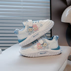Image showing a pair of black and white sneakers with a thick sole and a modern design.
